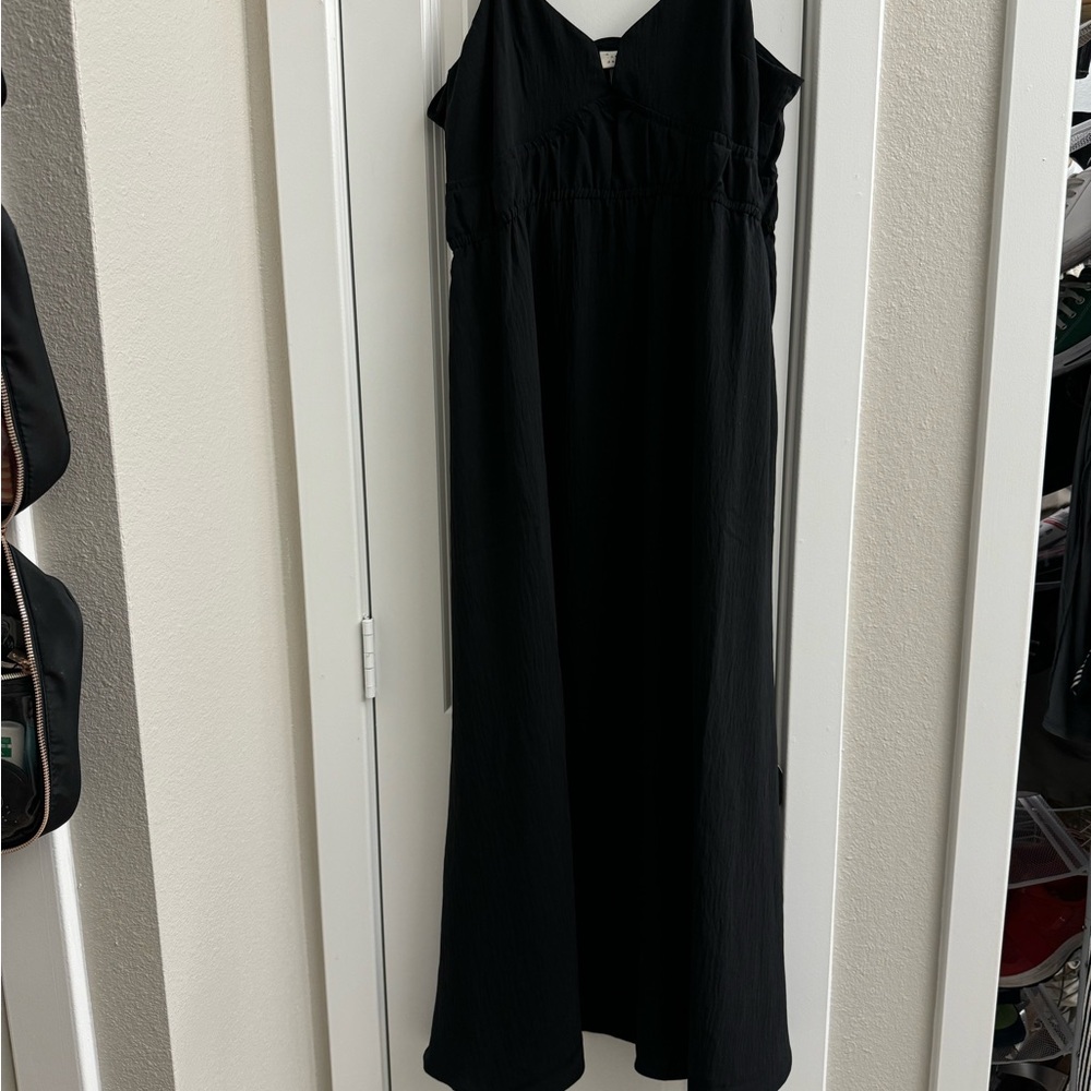 Never worn black dress. NWT.